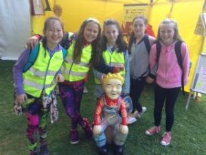 Some P7 girls with a minature Oor Wullie at the Flower & Food Festival